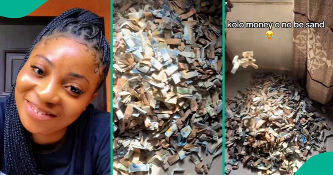Nigerian lady proudly shows off the huge cash that she saved. Nigerian lady proudly shows off the huge cash that she saved.