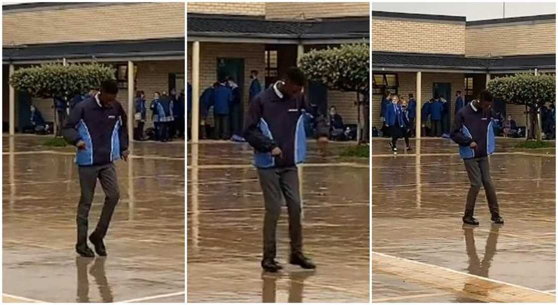 Young black boy dances on a wet floor