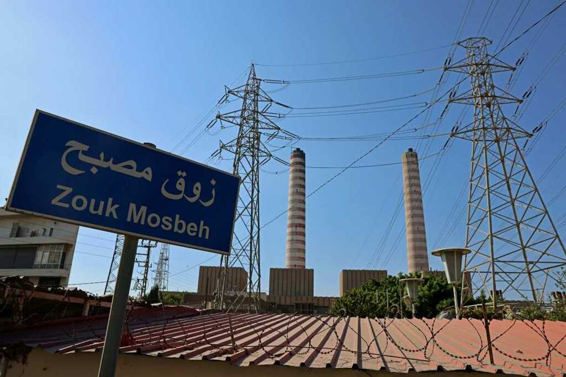 The plant is located at a low altitude, with heavy smoke trapped in the densely-populated area by nearby mountains The plant is located at a low altitude, with heavy smoke trapped in the densely-populated area by nearby mountains