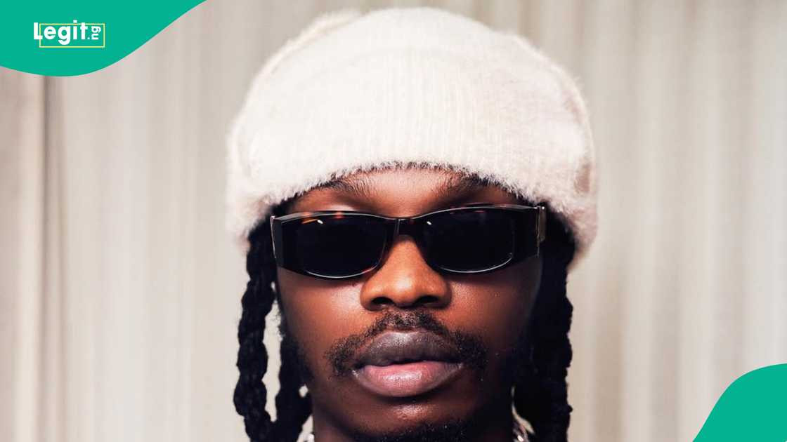Naira Marley and Sam Larry seen at a dealers' store buy car