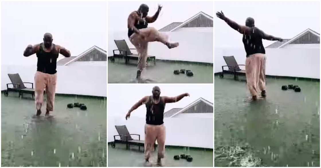 Don Jazzy dancing in the rain. Don Jazzy dancing in the rain.