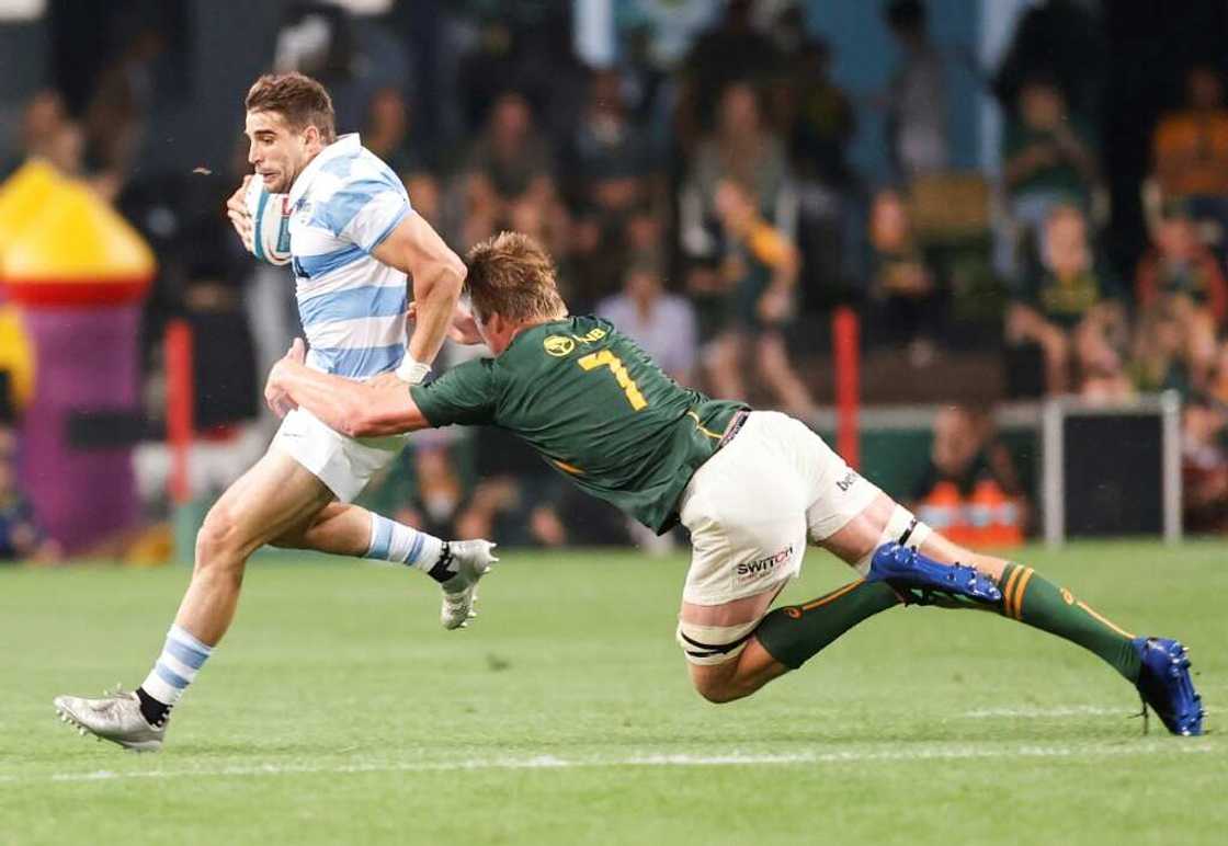South Africa flanker Pieter-Steph du Toit (R) tackles Argentina full-back Juan Cruz Mallia during a Rugby Championship match in Durban on September 24, 2022. South Africa flanker Pieter-Steph du Toit (R) tackles Argentina full-back Juan Cruz Mallia during a Rugby Championship match in Durban on September 24, 2022.