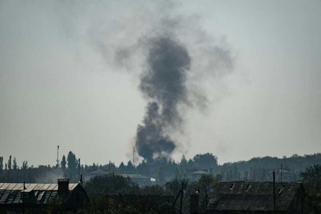 Smoke can be seen rising over Bakhmut in eastern Ukraine where Russian forces are battling with Kyiv's troops for control of the city