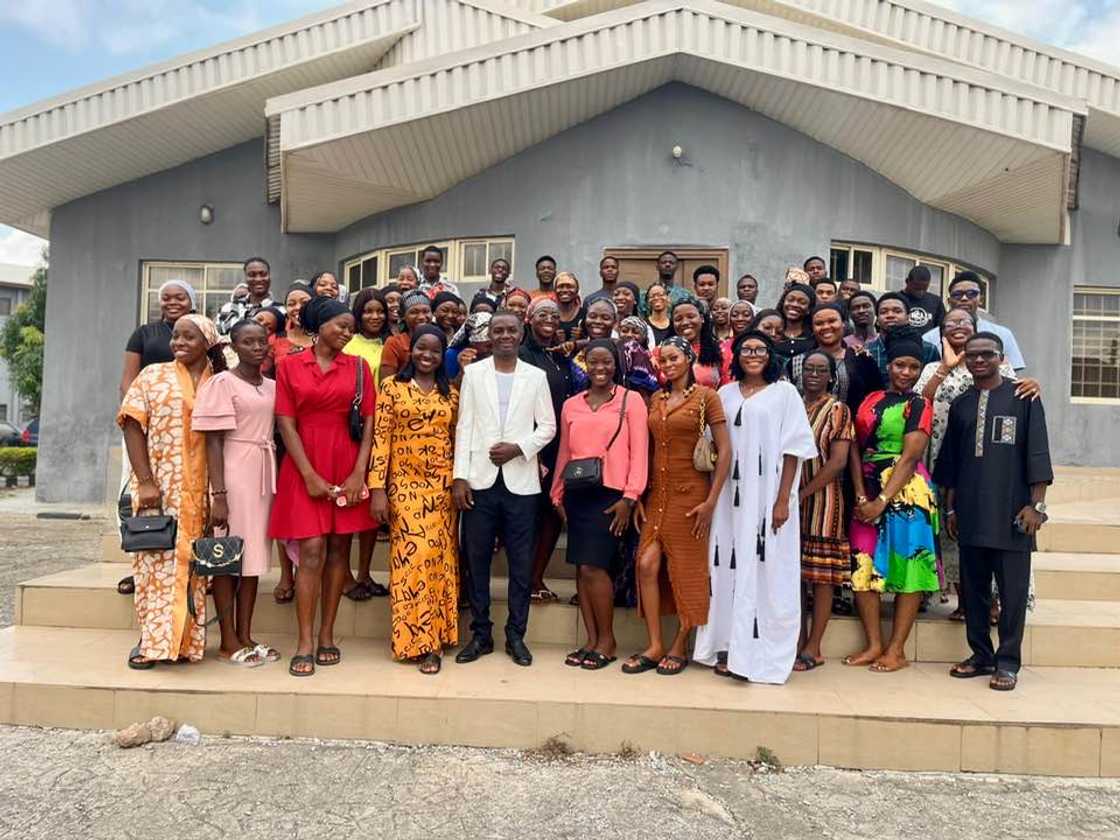 Madonna University students posing after mass