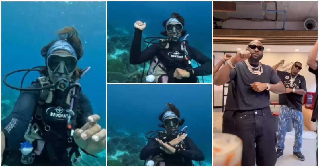 Oyinbo lady does Davido's Unavailable dance inside ocean. Oyinbo lady does Davido's Unavailable dance inside ocean.