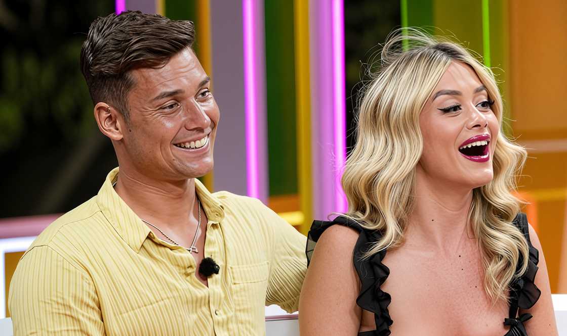 Aaron and Kaylor seated on a couch Aaron and Kaylor seated on a couch