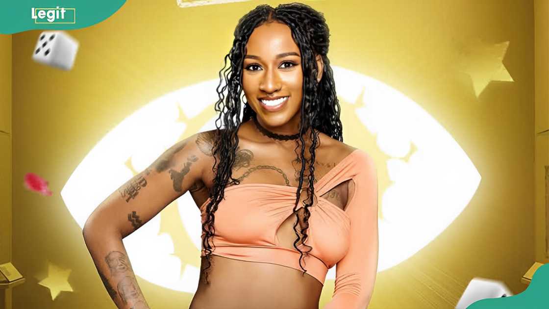 Ifeyinwa Okafor in a peach off-shoulder cut-out crop top Ifeyinwa Okafor in a peach off-shoulder cut-out crop top