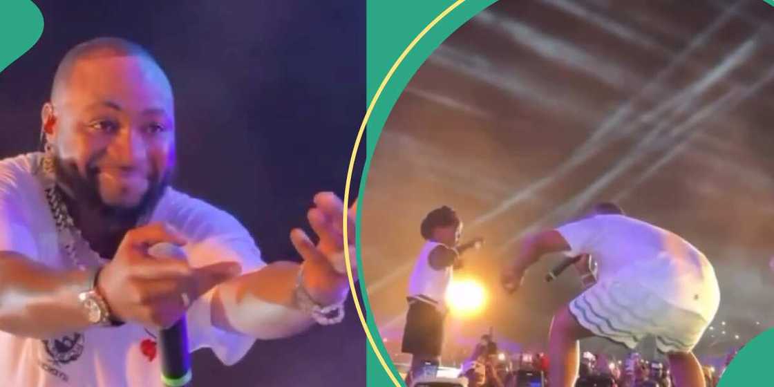 Davido dances with little girl on stage in Uganda.