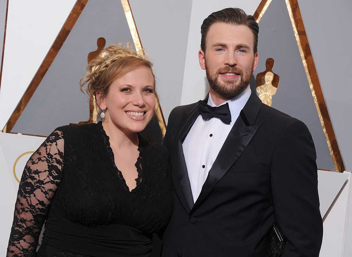Chris Evans and sister Carly Evans posing at the 88th Annual Academy Awards Chris Evans and sister Carly Evans posing at the 88th Annual Academy Awards