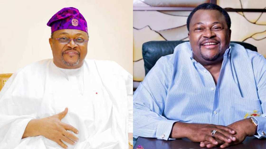 Mike Adenuga is pictured in a white Agbada and a blue shirt