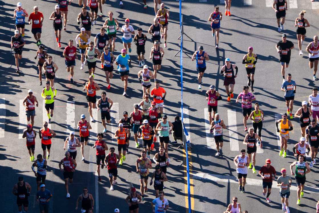 Runners compete down Fifth Avenue in the Bay Ridge neighbourhood of Brooklyn