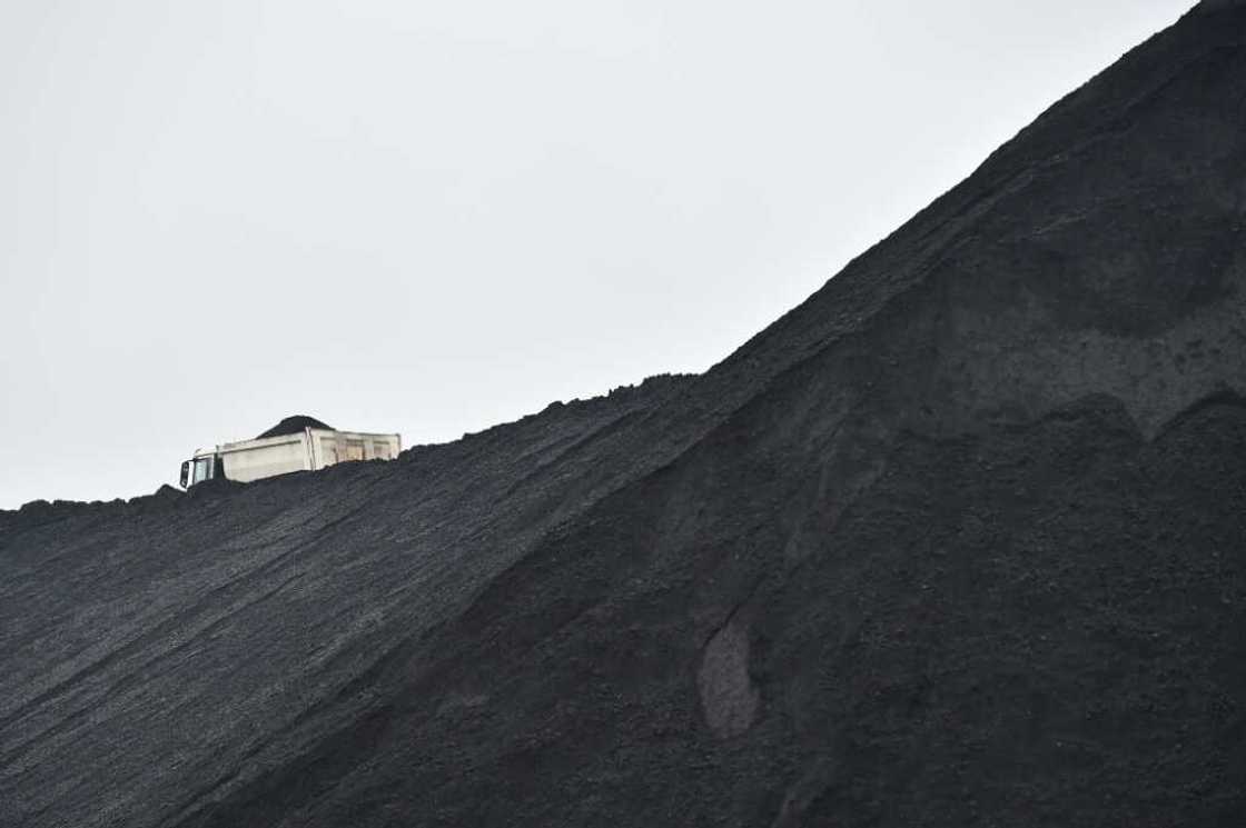 While burning coal for energy helped grow economies worldwide, the carbon-dioxide-producing rock is one of the key drivers of global warming. While burning coal for energy helped grow economies worldwide, the carbon-dioxide-producing rock is one of the key drivers of global warming.
