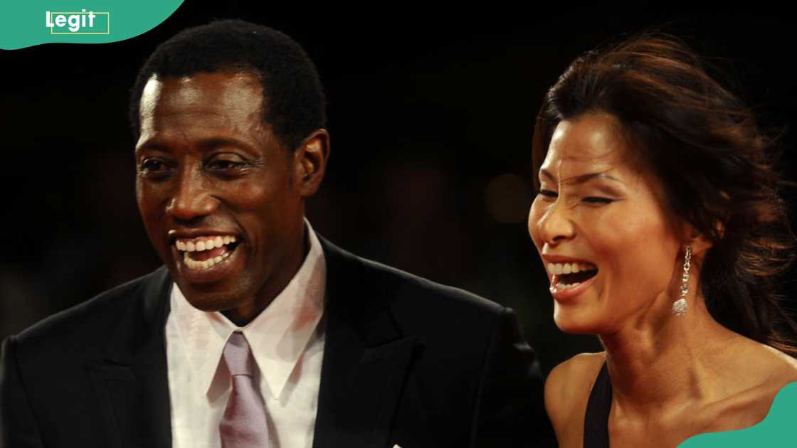 US actor Wesley Snipes and his wife Nikki Park at the Venice film festival US actor Wesley Snipes and his wife Nikki Park at the Venice film festival