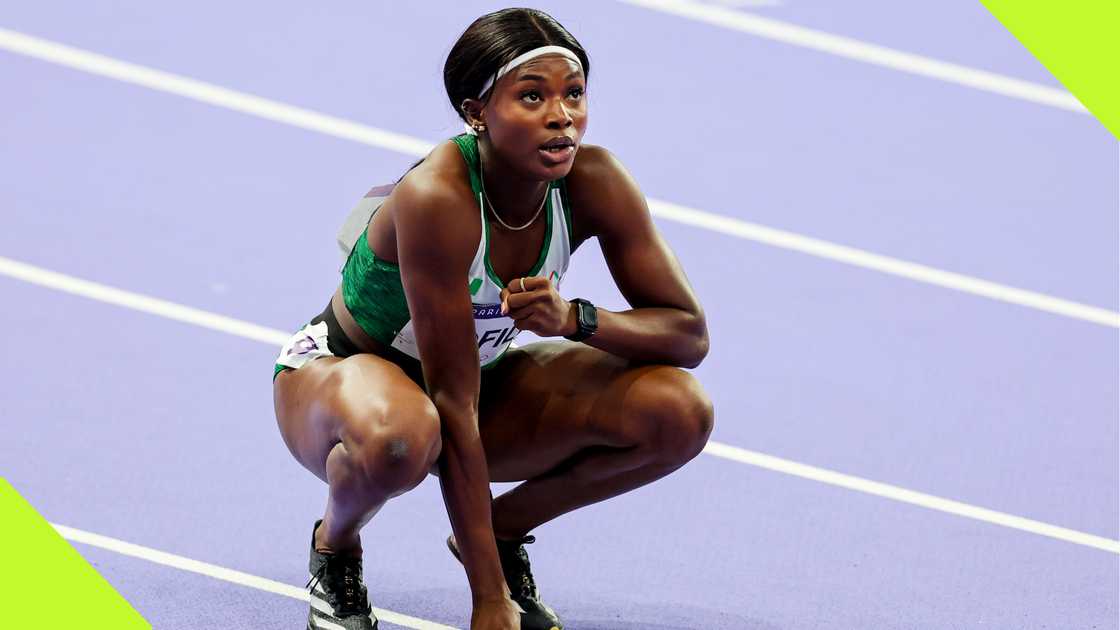 Favour Ofili squats after her Paris 2024 Olympics 200m event. Favour Ofili squats after her Paris 2024 Olympics 200m event.