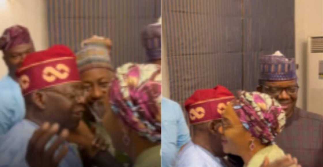 Tinubu hugs wife