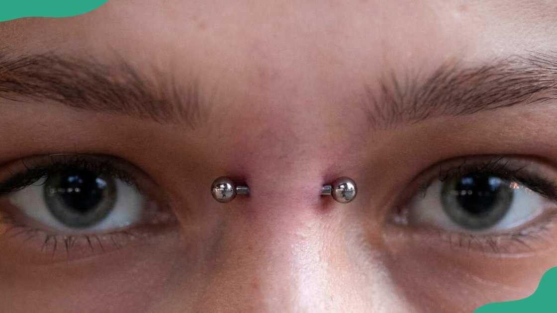 Girl with a bridge piercing