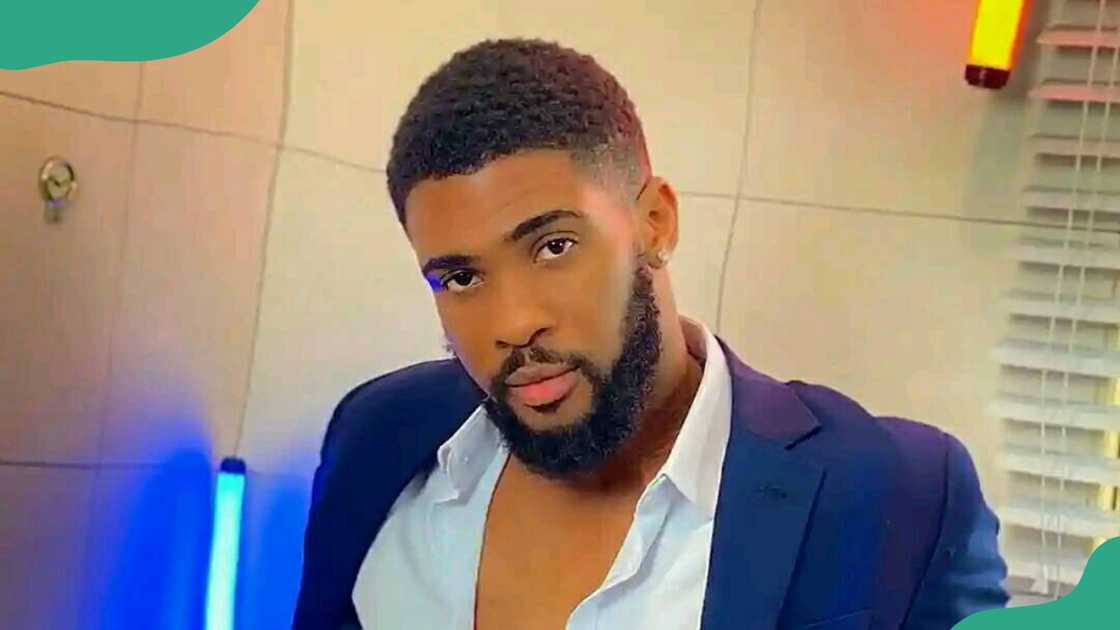 Bright Morgan stuns in a blue suit and white shirt.