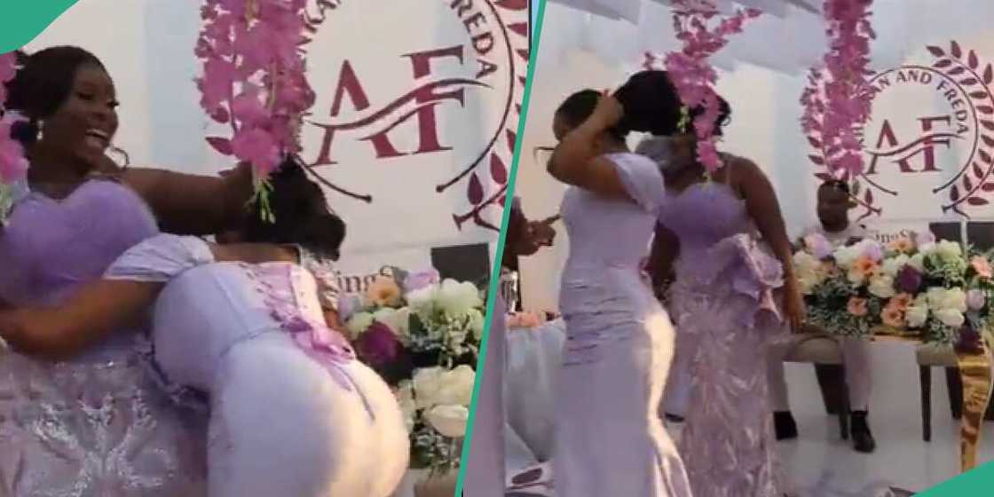 Bridesmaid hugs bride as he wig comes off