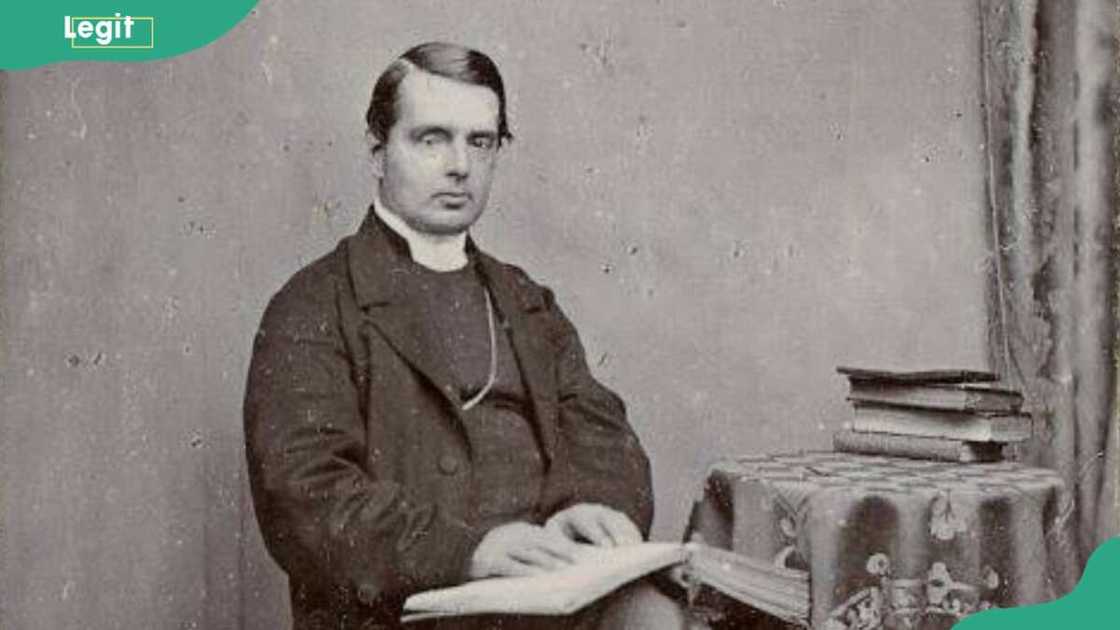 Louis Braille holding a book Louis Braille holding a book