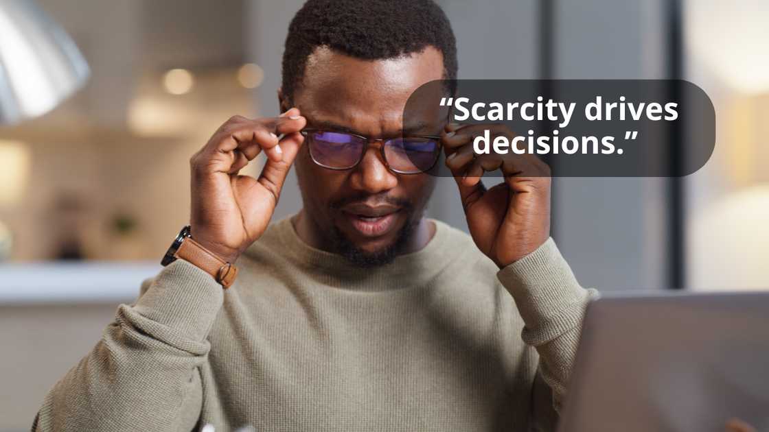 A mam removing his glasses A mam removing his glasses