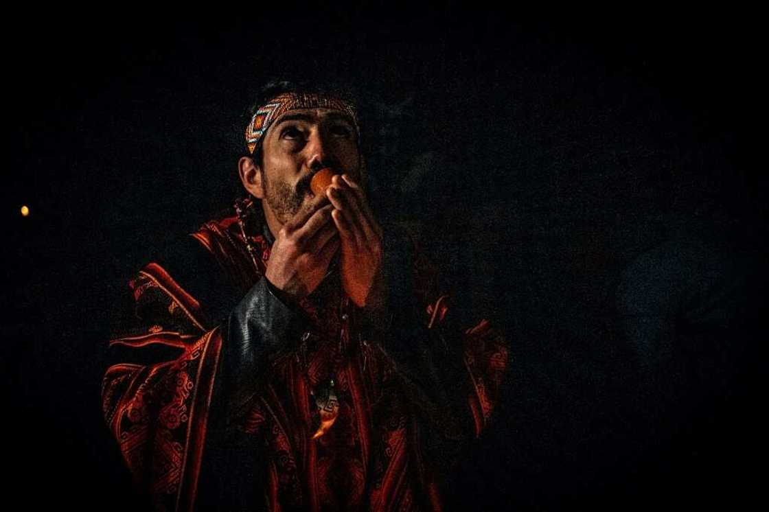 The drinking of ayahuasca during a ceremony The drinking of ayahuasca during a ceremony