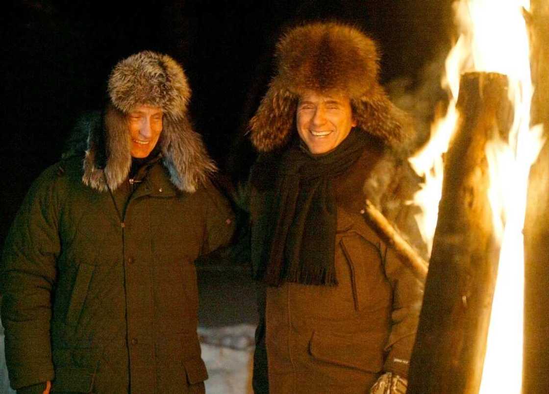 Berlusconi was for years close to Russian President Vladimir Putin, shown here in Russia in February, 2003 Berlusconi was for years close to Russian President Vladimir Putin, shown here in Russia in February, 2003