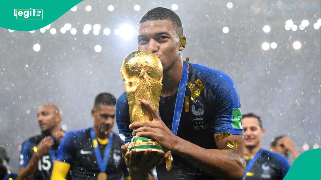 Kylian Mbappe celebrates with the World Cup trophy after the 2018 FIFA World Cup Final against Croatia. Photo by Matthias Hangst