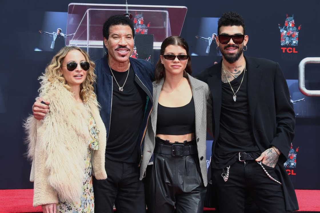 Nicole Richie, Lionel Richie, Sofia Richie and Miles Richie. Nicole Richie, Lionel Richie, Sofia Richie and Miles Richie.
