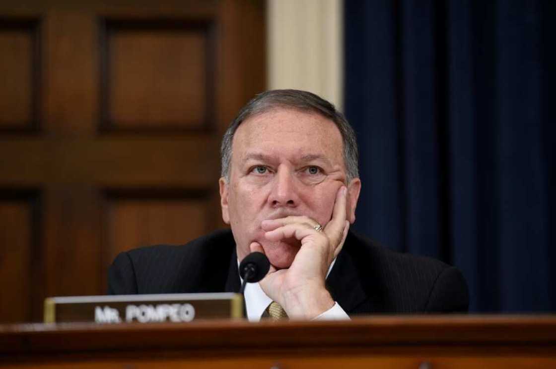 Mike Pompeo, then a Republican congressman, listens as former secretary of state Hillary Clinton addresses a committee in 2015 about the deadly attack on US diplomatic facilities in Benghazi, Libya Mike Pompeo, then a Republican congressman, listens as former secretary of state Hillary Clinton addresses a committee in 2015 about the deadly attack on US diplomatic facilities in Benghazi, Libya
