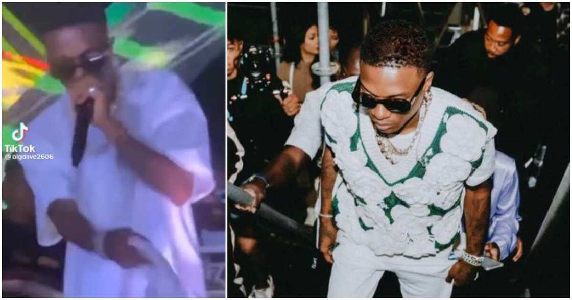 Wizkid lashes out at someone during show. Wizkid lashes out at someone during show.