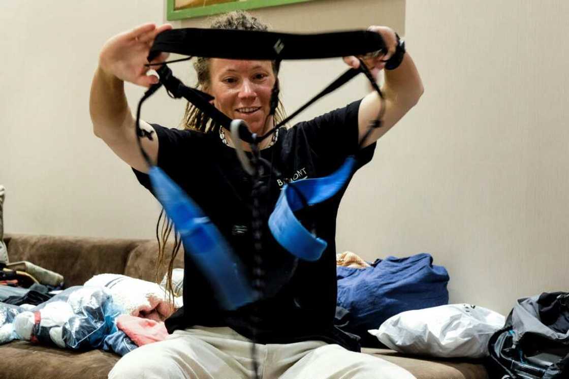 Kristin Harila checks her gear in her hotel room in Nepal in the early stages of her record attempt Kristin Harila checks her gear in her hotel room in Nepal in the early stages of her record attempt
