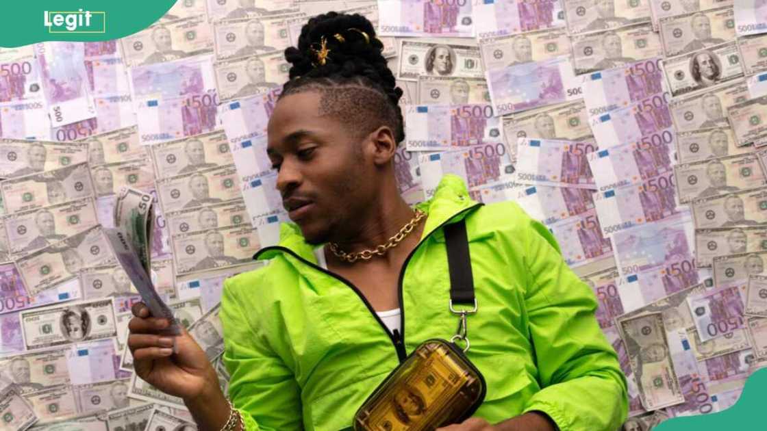 a man pondering over the characteristics of money a man pondering over the characteristics of money