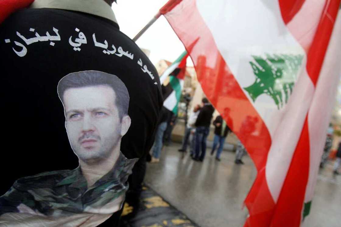 Key figure: a Lebanese man wears a T-shirt with a picture of Maher al-Assad at a pro-Syrian regime rally in Beirut in 2012