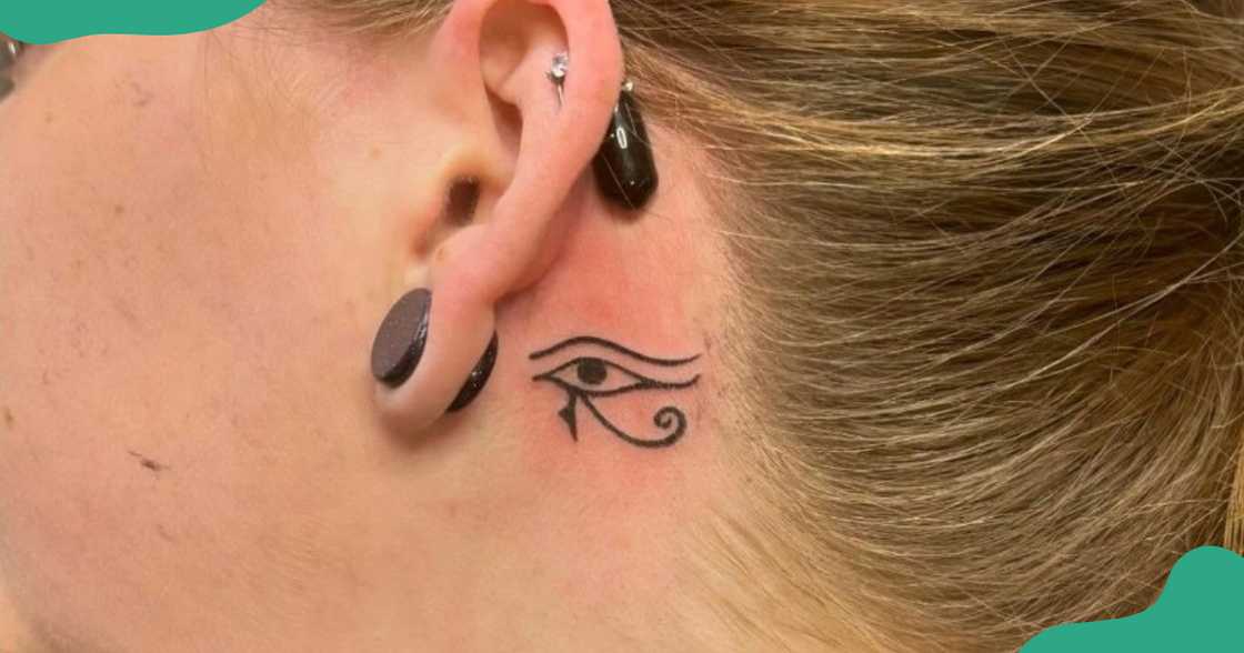 An Eye of Horus tattoo on the ear An Eye of Horus tattoo on the ear