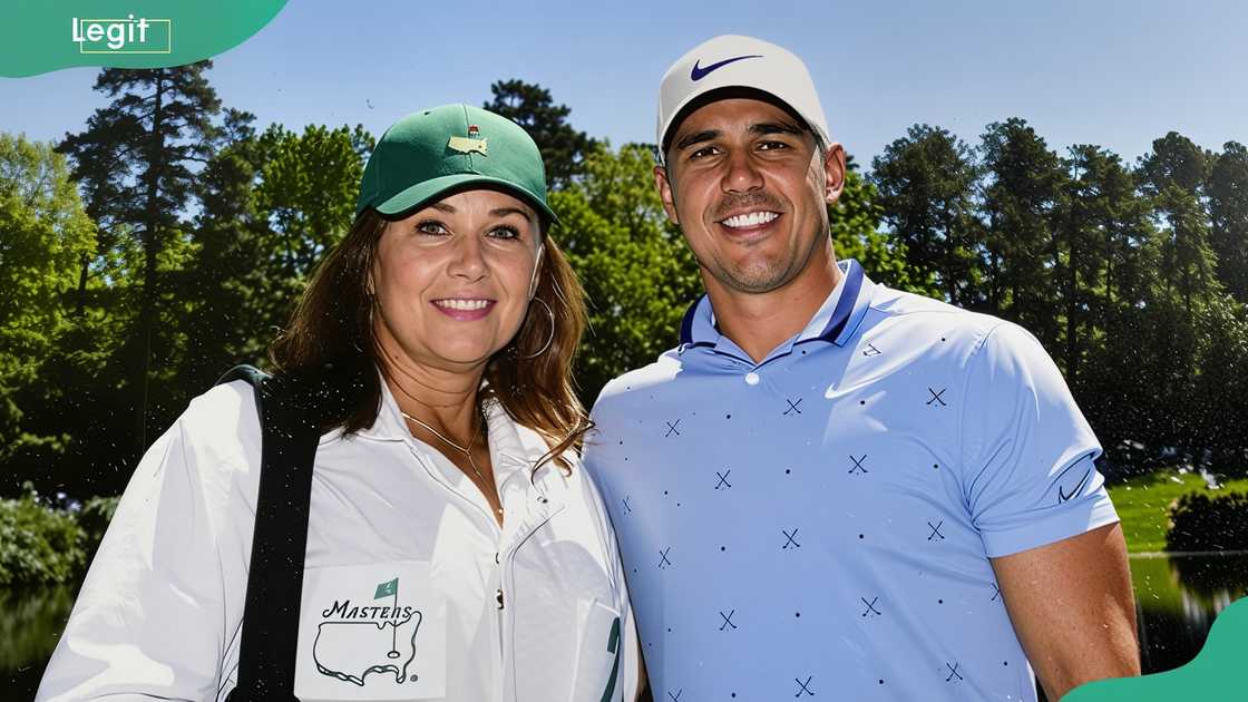 Denise Jakows posing with her son, Brooks Koepka, in an open field