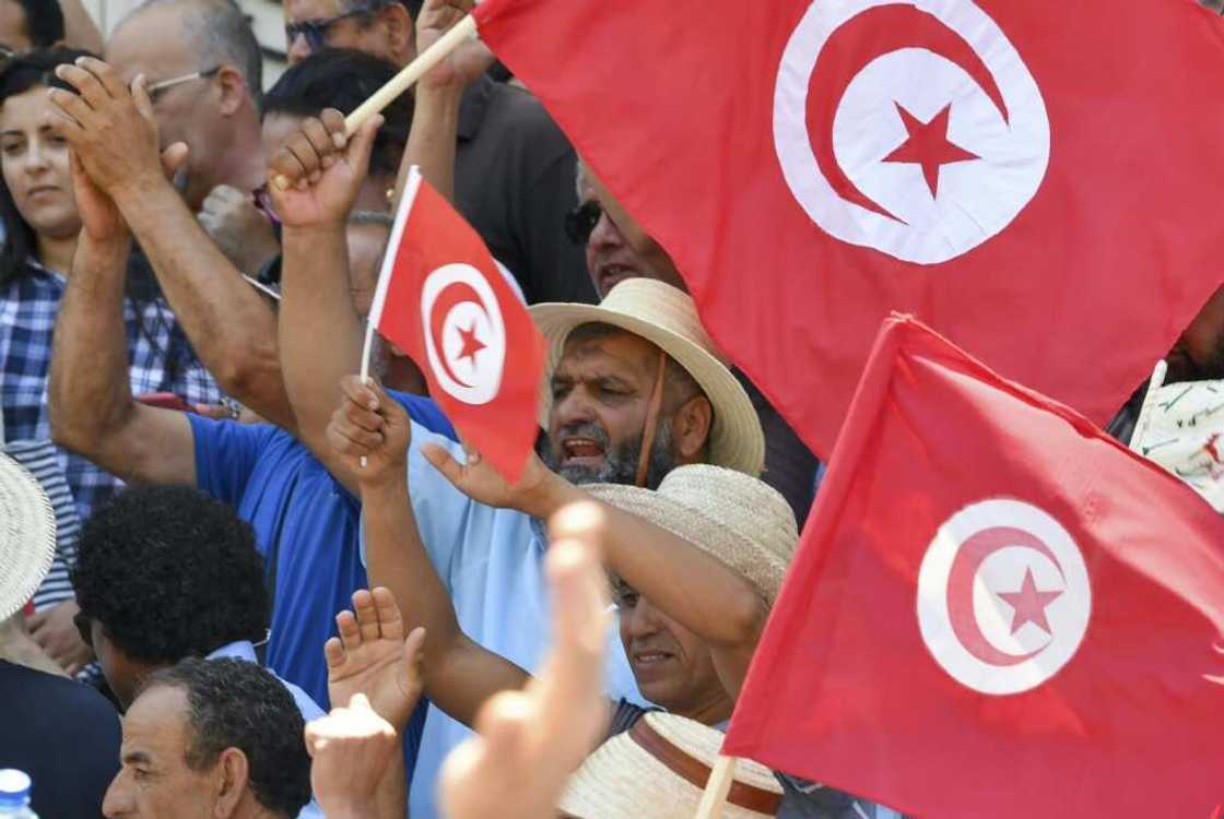 Tunisians in the capital Tunis protest on June 19, 2022 against President Kais Saied and the constitutional referendum to be held on July 25 Tunisians in the capital Tunis protest on June 19, 2022 against President Kais Saied and the constitutional referendum to be held on July 25