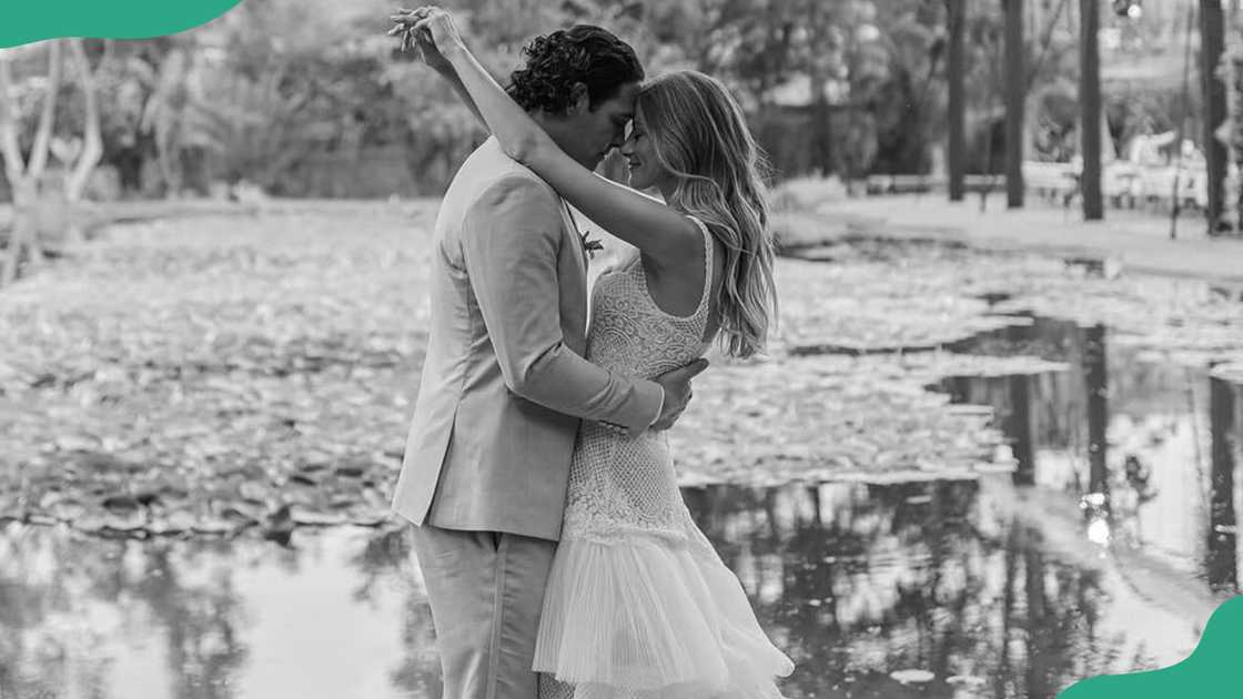 Mark Sanchez and Perry Mattfeld embrace on their wedding