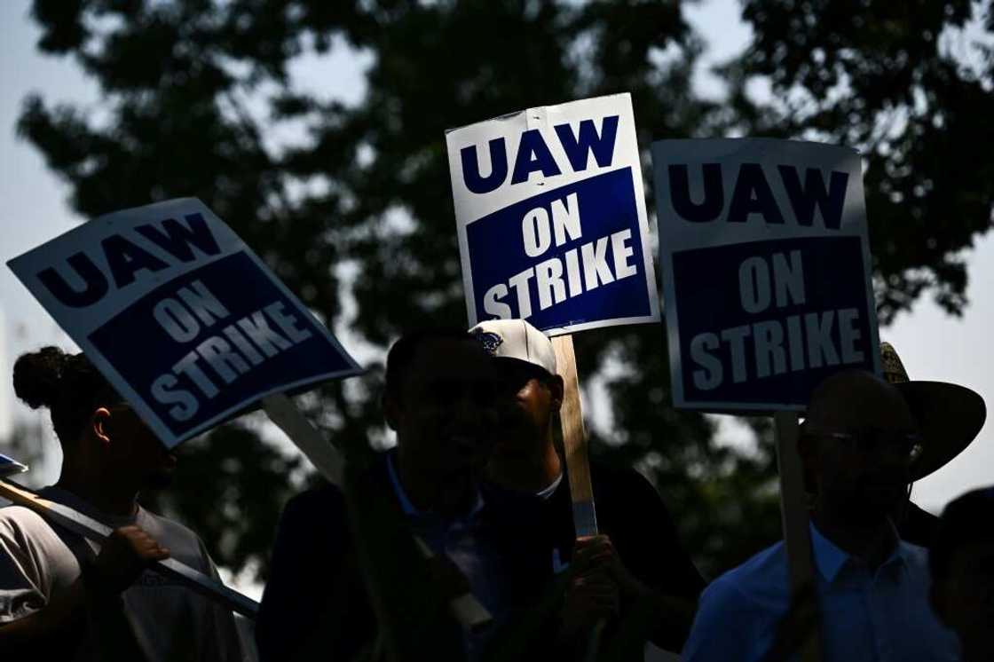 Members of the United Auto Workers (UAW) Local 230 and their supporters walk the picket line in front of the Chrysler Corporate Parts Division in Ontario, California, on September 26, 2023, to show solidarity for the "Big Three" autoworkers on strike Members of the United Auto Workers (UAW) Local 230 and their supporters walk the picket line in front of the Chrysler Corporate Parts Division in Ontario, California, on September 26, 2023, to show solidarity for the "Big Three" autoworkers on strike