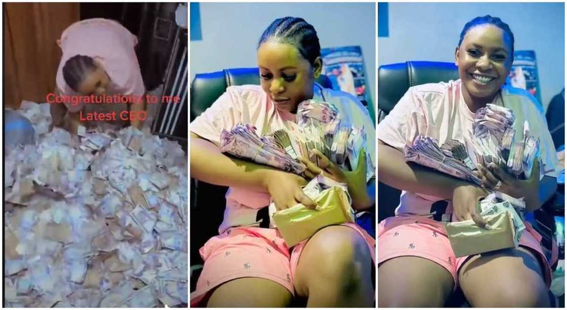 Photos of a Nigerian lady displaying bundles of Naira notes. Photos of a Nigerian lady displaying bundles of Naira notes.