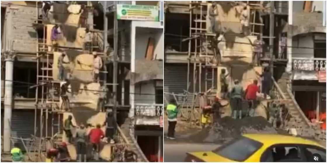 The construction workers embraced team work The construction workers embraced team work