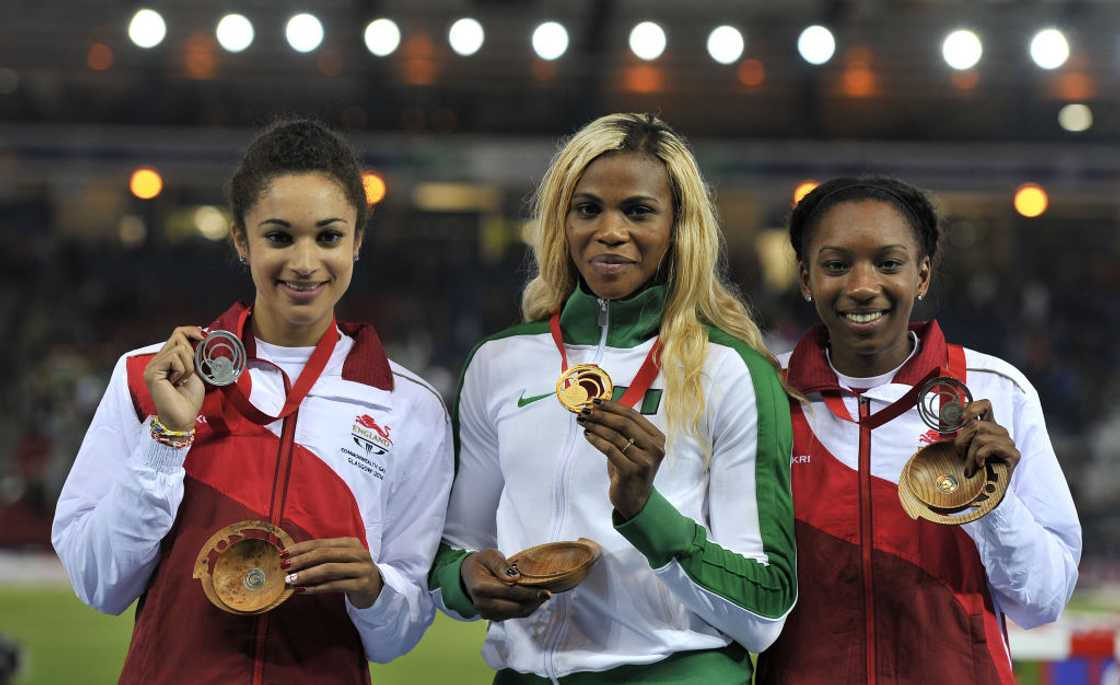 Blessing Okagbare (Centre), celebrates a podium finish at the 2014 Commonwealth Games Blessing Okagbare (Centre), celebrates a podium finish at the 2014 Commonwealth Games
