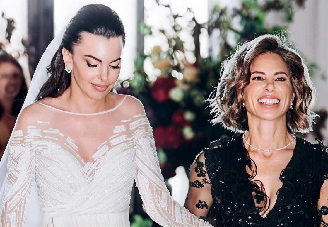 Jillian Michaels and DeShanna Marie Minuto walk during their wedding Jillian Michaels and DeShanna Marie Minuto walk during their wedding