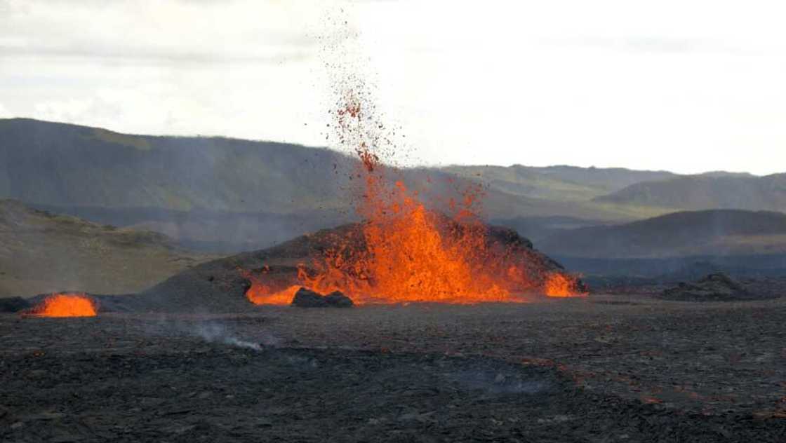 The lava fountains spurt as high as 70 meters (230 feet) The lava fountains spurt as high as 70 meters (230 feet)