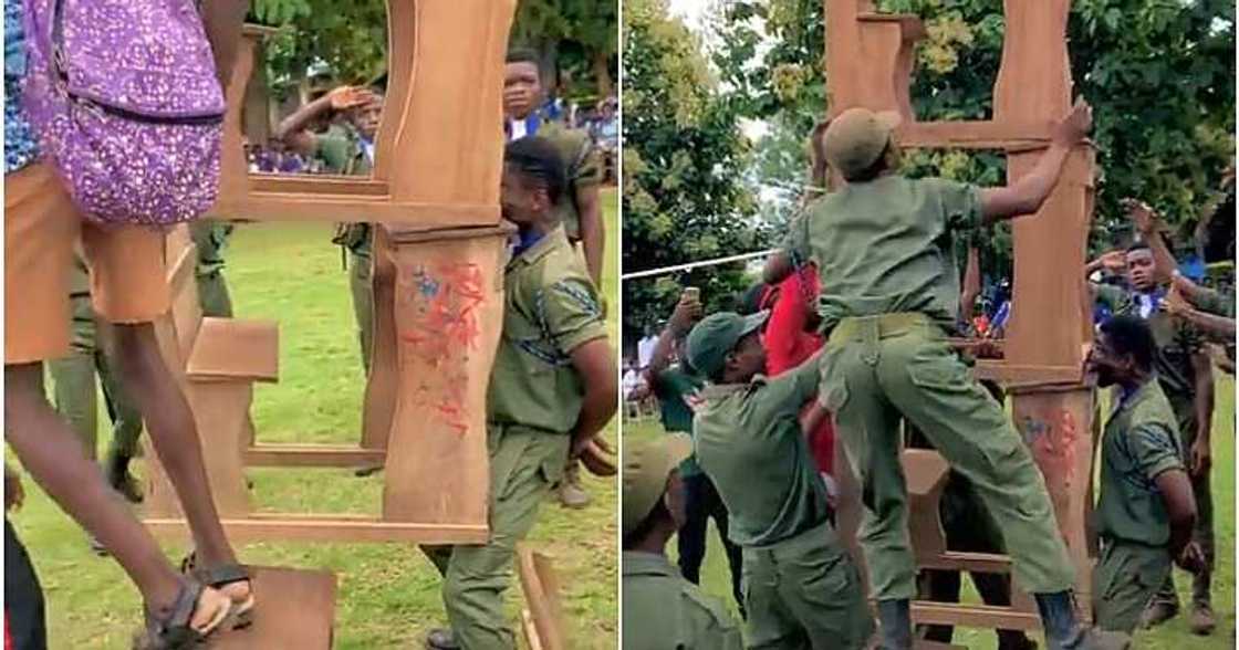 Man lifts tables, teeth, juju Man lifts tables, teeth, juju