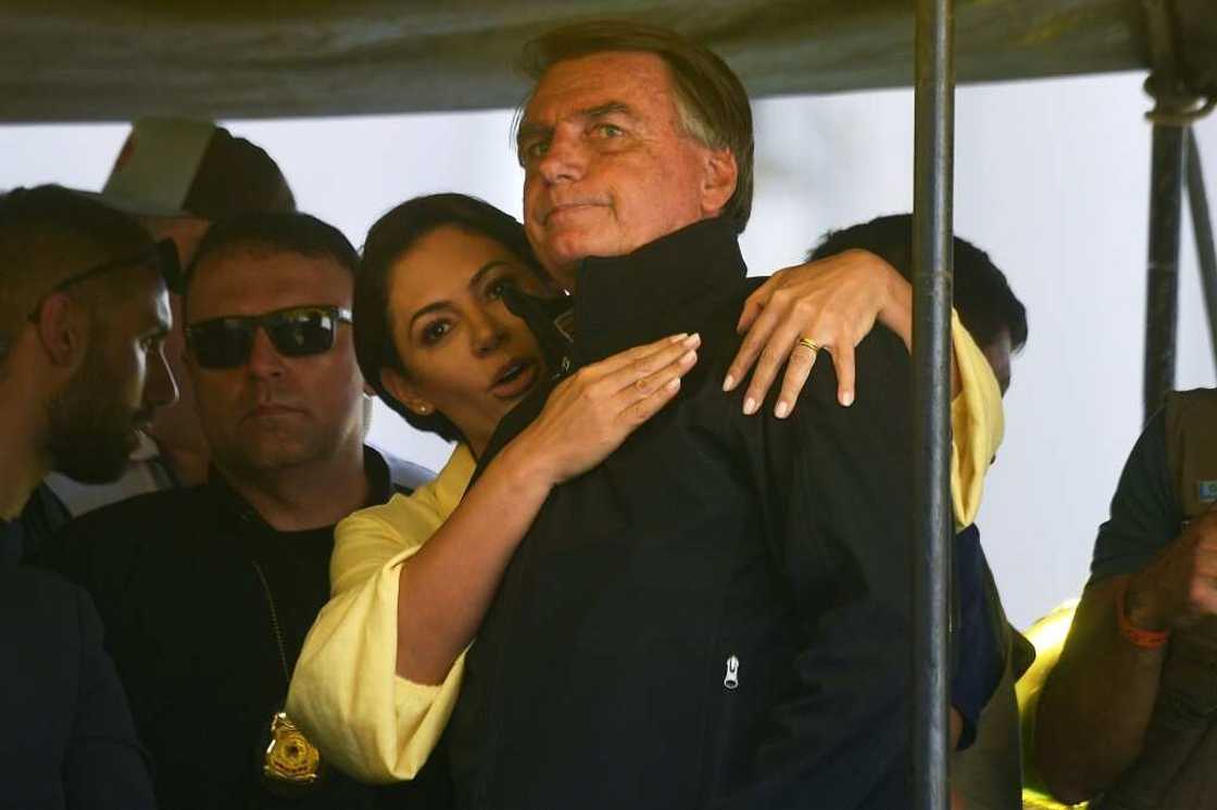 Brazilian President Jair Bolsonaro with his wife Michelle at the launch of his re-election campaign in Juiz de Fora, in the state of Minas Gerais on August 16 2022