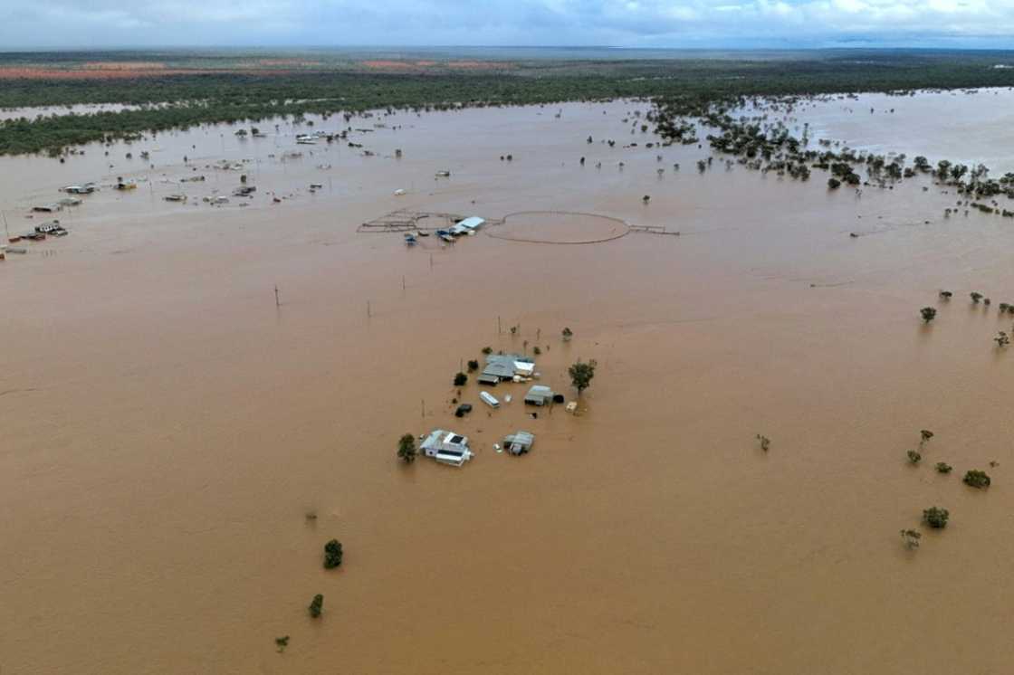 Homes inubdated by floodwaters in the town of Windorah in central-west Queensland, Australia Homes inubdated by floodwaters in the town of Windorah in central-west Queensland, Australia