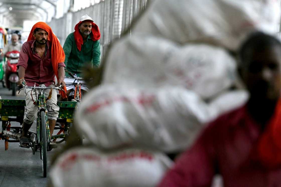 Businesses in India have blamed protracted summer heatwaves for hampering consumption Businesses in India have blamed protracted summer heatwaves for hampering consumption