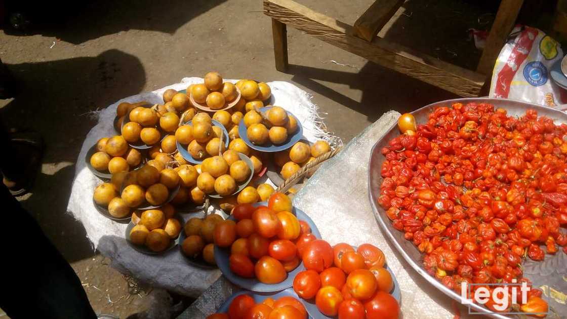 African star apple, tomatoes and pepper on display at a popular market in Lagos. Photo credit: Esther Odili