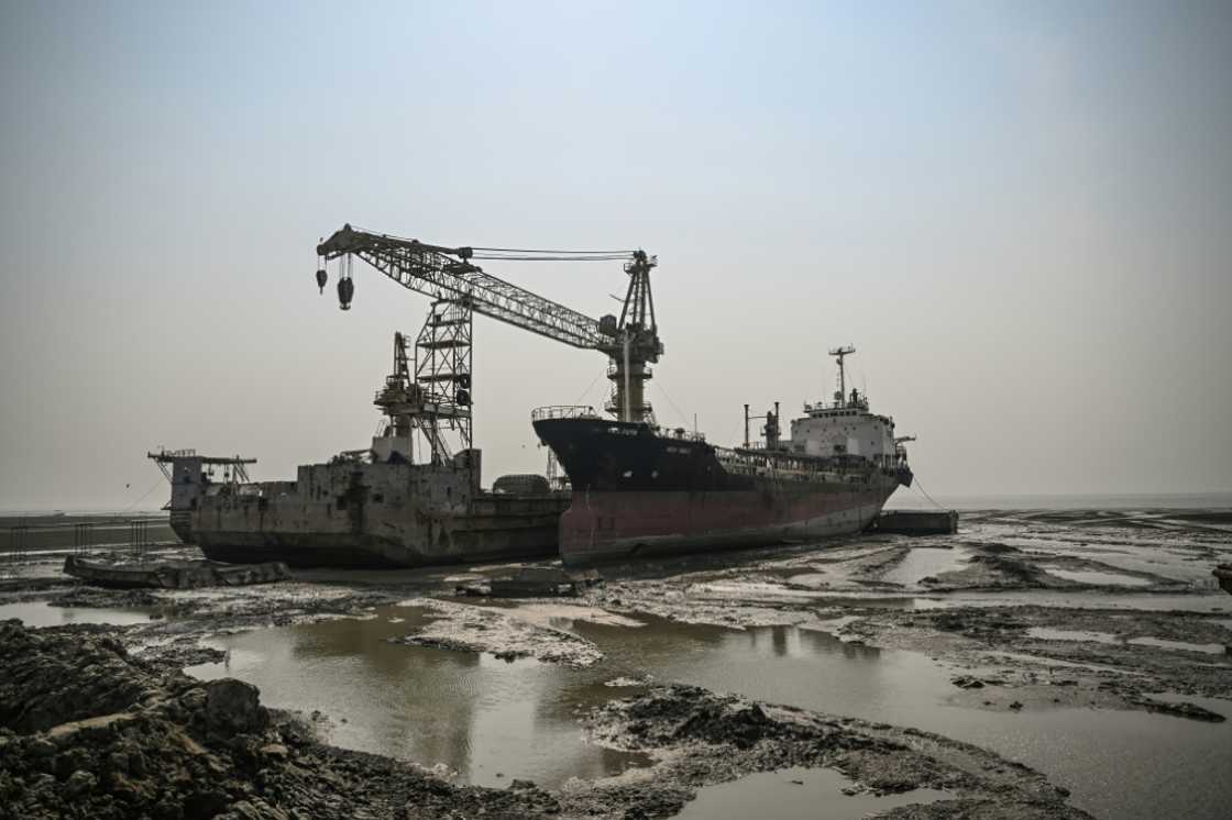 Ships being dismantled on the beach in Chittagong, Bangladesh Ships being dismantled on the beach in Chittagong, Bangladesh