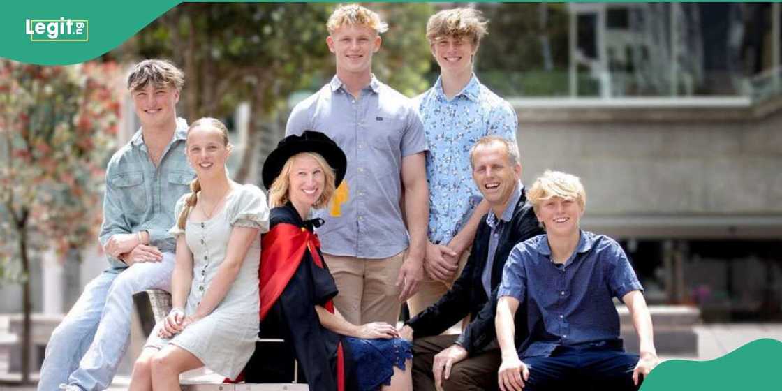 Woman graduates wth PhD degree while raising 5 children